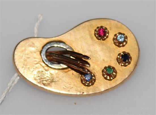 A novelty 18ct gold and gem set brooch modelled as an artists pallet, 35mm.